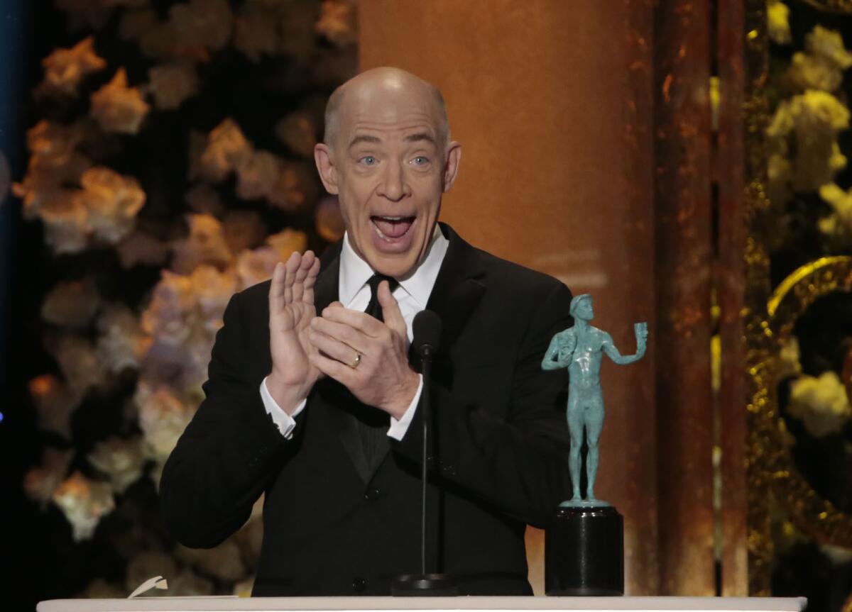 J.K. Simmons accepts his Screen Actors Guild award for best supporting actor at the Shrine Auditorium in Los Angeles.