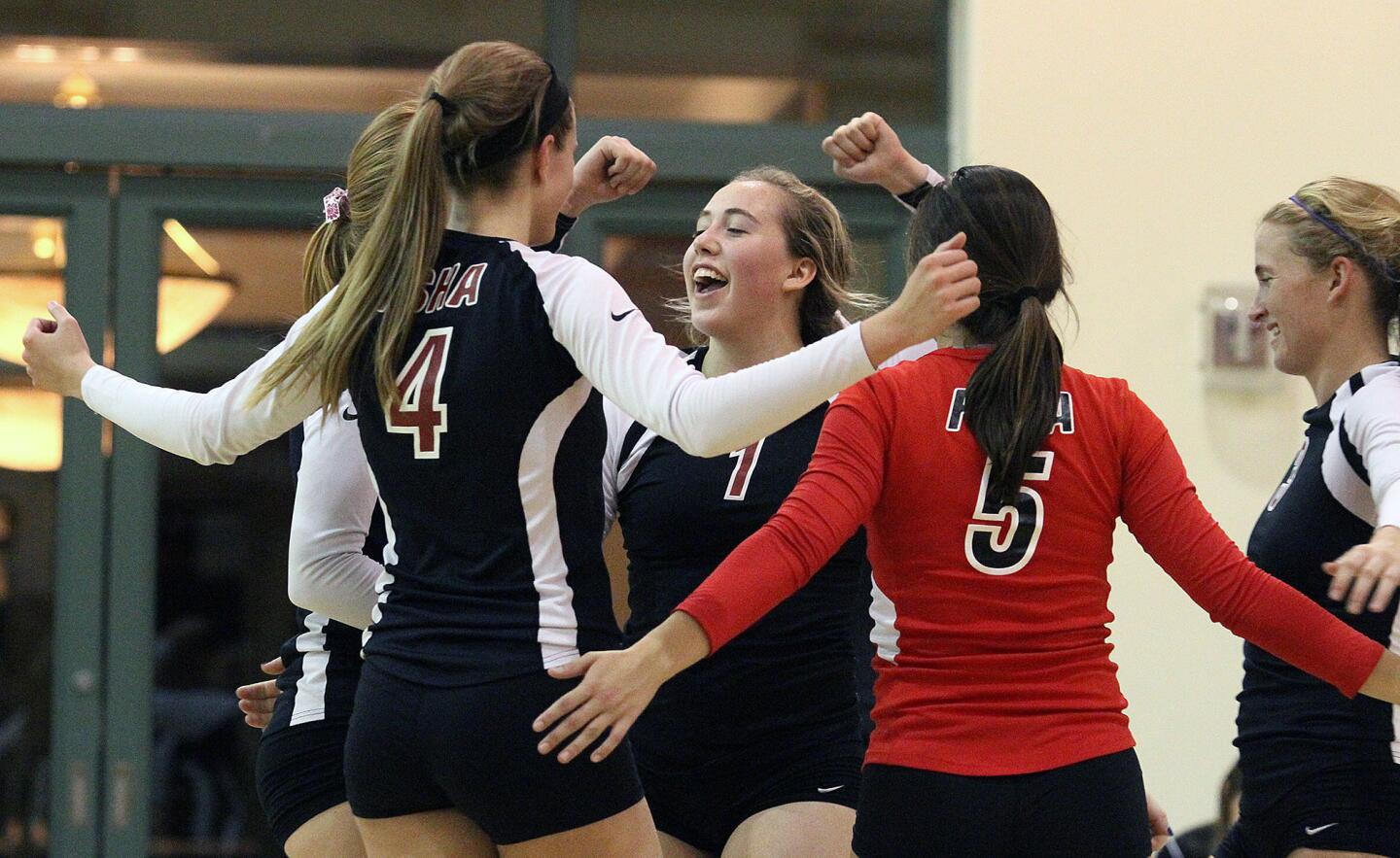 Flintridge Sacred Heart's Sophia Coffey celebrates with her teammates after defeating Ayala in a first-round CIF Southern Section Division 1-A volleyball match at FSHA on Tuesday, November 12, 2013. FSHA won the match 3-1. (Tim Berger/Staff Photographer)