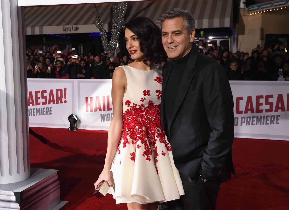 Actor George Clooney and his wife, Amal Clooney, attend Universal Pictures' "Hail, Caesar!" premiere at Regency Village Theatre on Monday in Westwood.