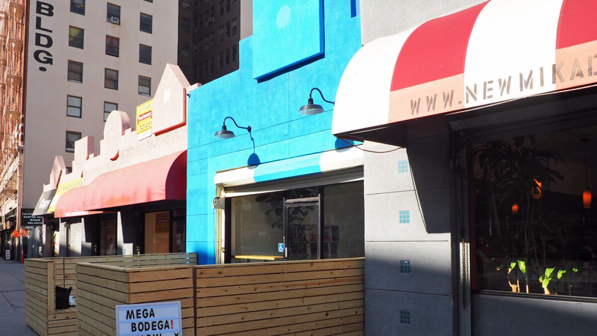 The storefront of Mega Bodega, a new cafe in downtown L.A.