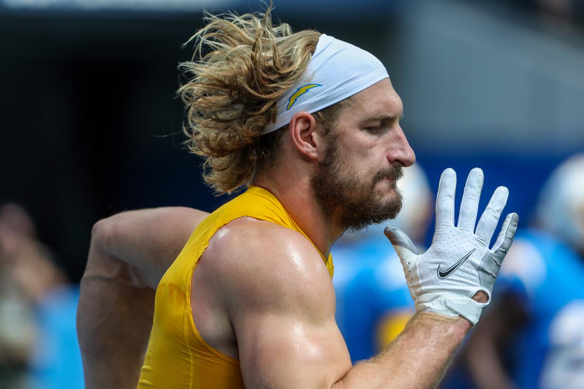 Chargers linebacker Joey Bosa (97) warms up before a game in September.