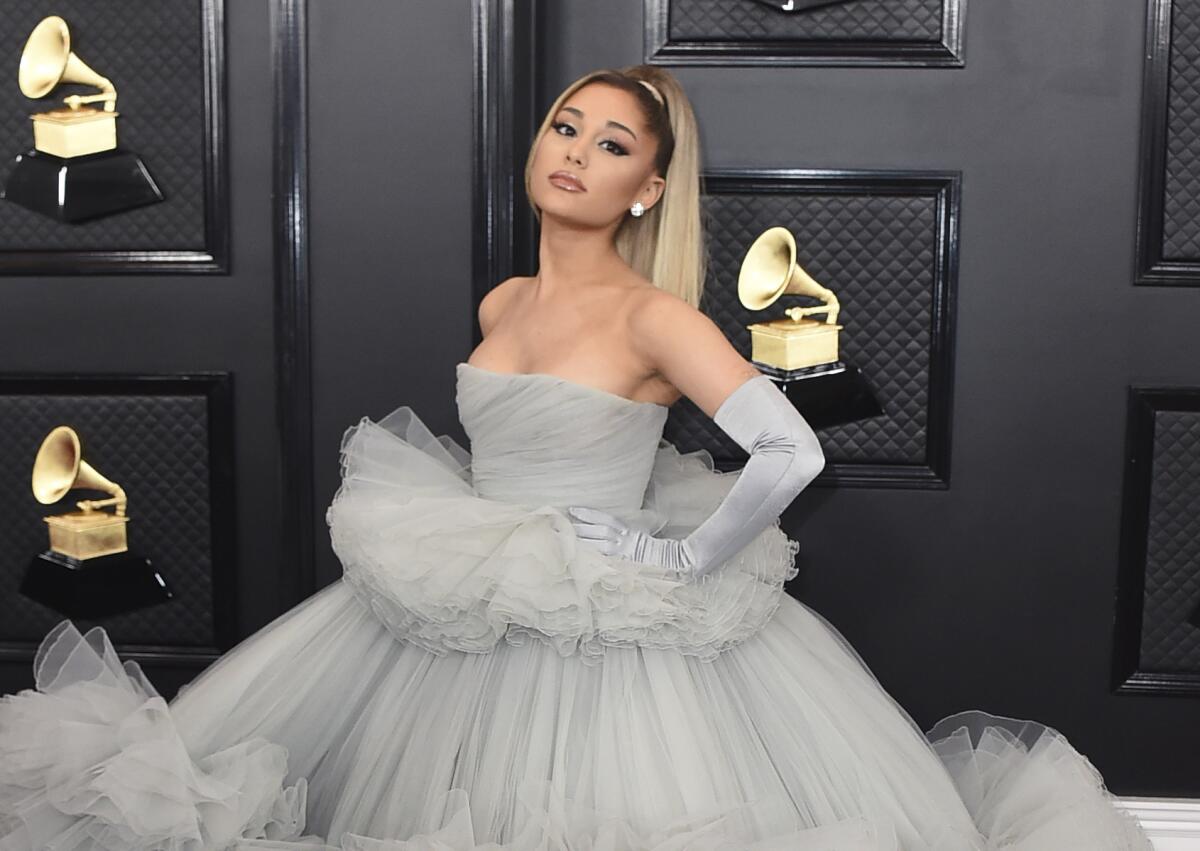 Ariana Grande in a gray tulle gown and gloves at the Grammys.