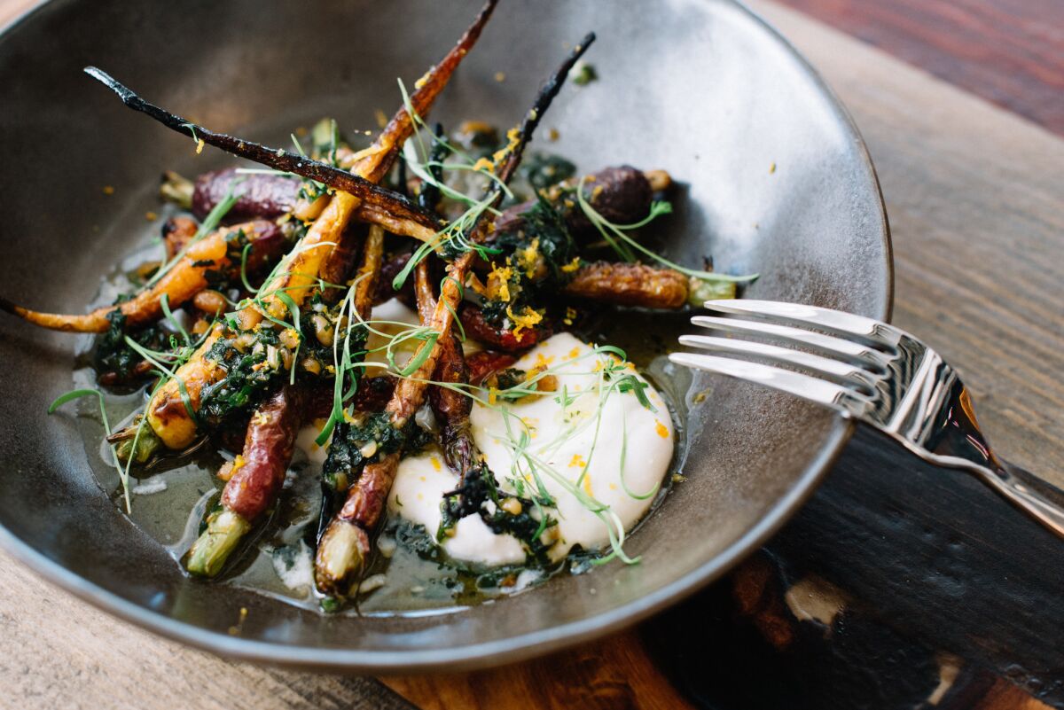 Biga's tagline is "cucinato a legno," or wood-fired, like these charred carrots. The downtown San Diego restaurant is participating in Farm to Fork Week, which kicks off Sunday and runs through Sept. 15.