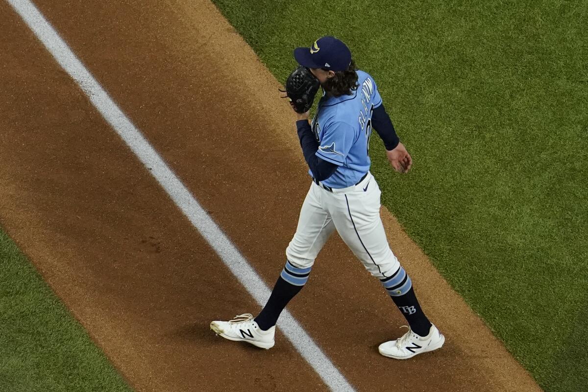Tampa Bay Rays starting pitcher Tyler Glasnow walks to the dugout during the first inning of Game 5.