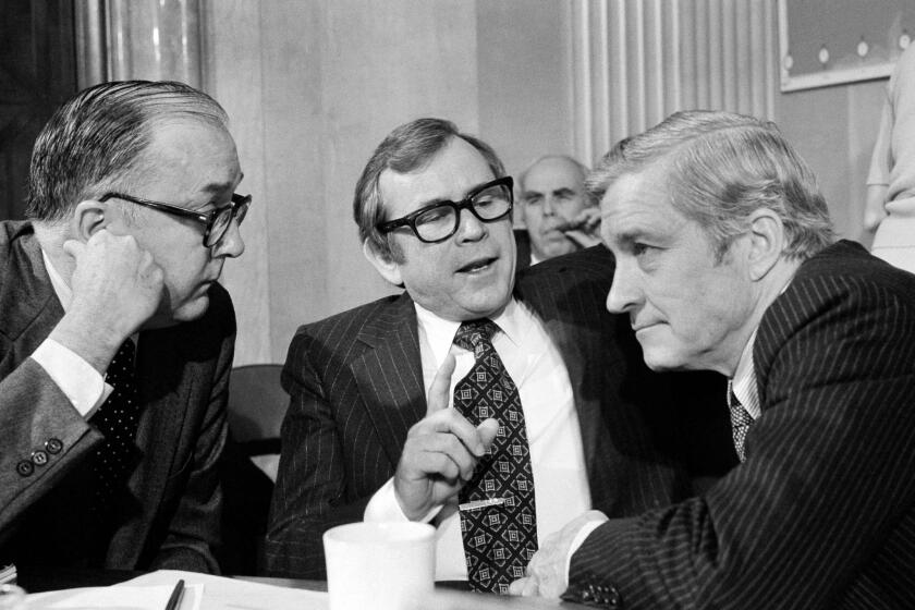 Sen. Howard Baker, center, in 1979 with colleagues Jesse Helms, left, and Charles Percy.