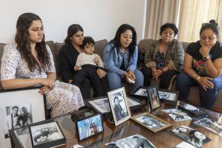 Los Angeles, CA - May 18: From left: Nailea Vera Castellanos, wife of Jesus Castellanos, who was fatally shot by the LAPD on April 6 while holding a knife, their son, whom they requested not be identified by name, Dayanara Gonzalez, niece (Cristian's daughter) Cristian Mendoza, sister, Maria Sanchez, mother, and Sagui Lopez talk about their memories of Alan at their Los Angeles home Wednesday, May 18, 2022. Officers shot him simultaneously with lethal and less lethal weapons. (Allen J. Schaben / Los Angeles Times)