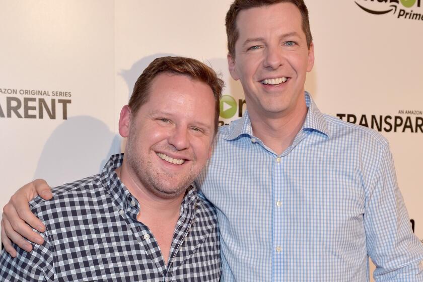 Sean Hayes, right, and Scott Icenogle are engaged.