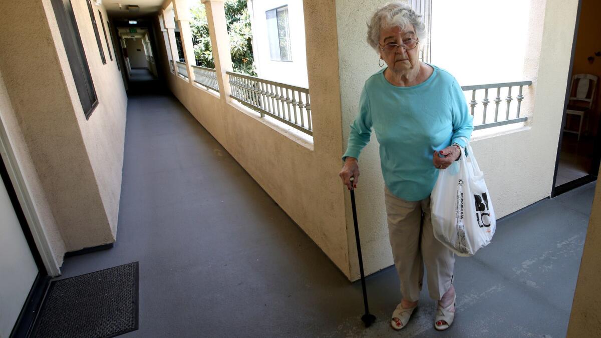 Elizabeth Malone, 93, was one of 85 residents at a Montrose senior apartment building who had to live without an elevator for nearly two weeks. The landord of the facility was charged with a criminal code violation and is due back in court in two weeks.