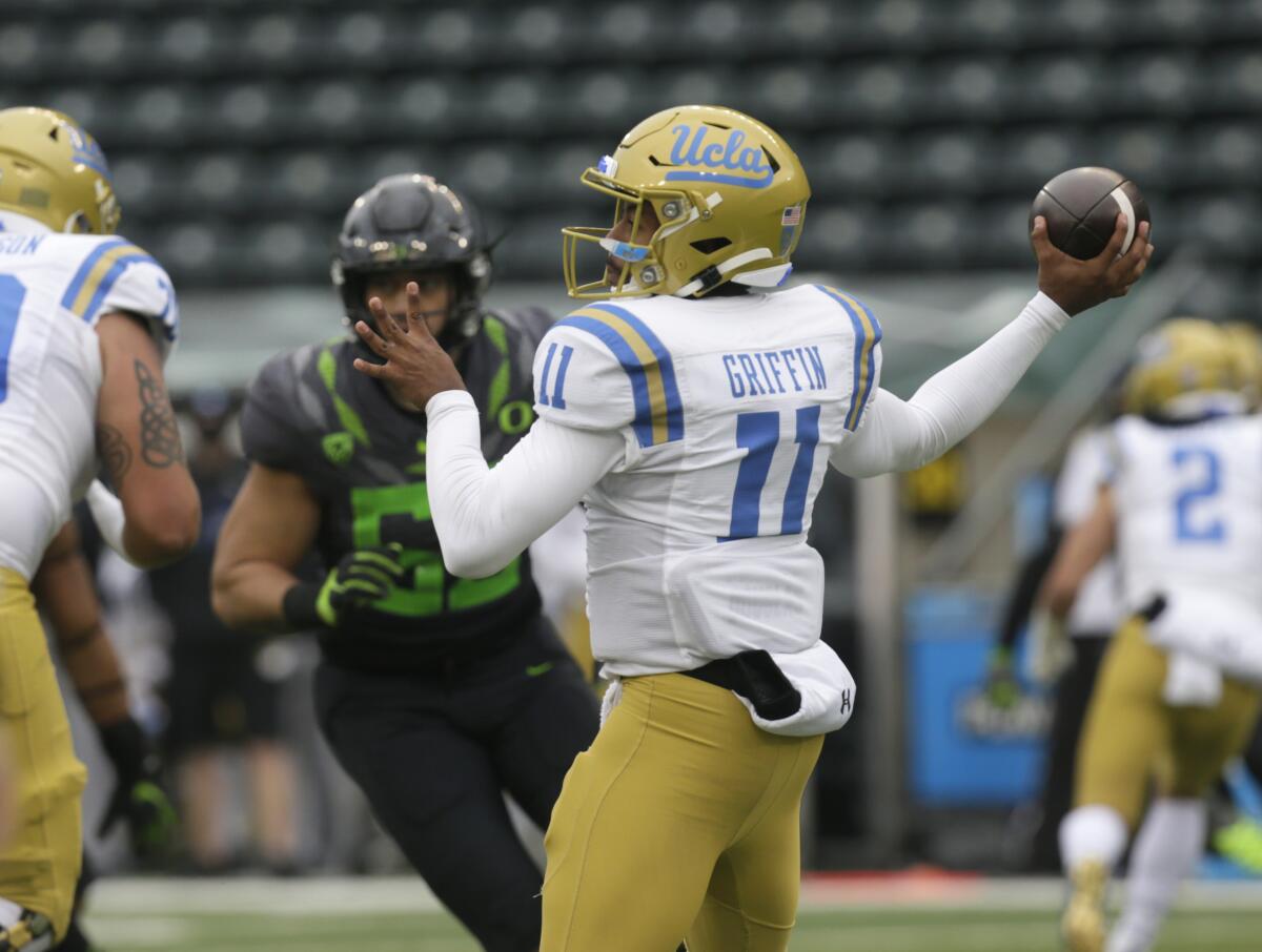 UCLA's Chase Griffin throws downfield against Oregon during the second quarter Nov. 21, 2020, in Eugene, Ore.
