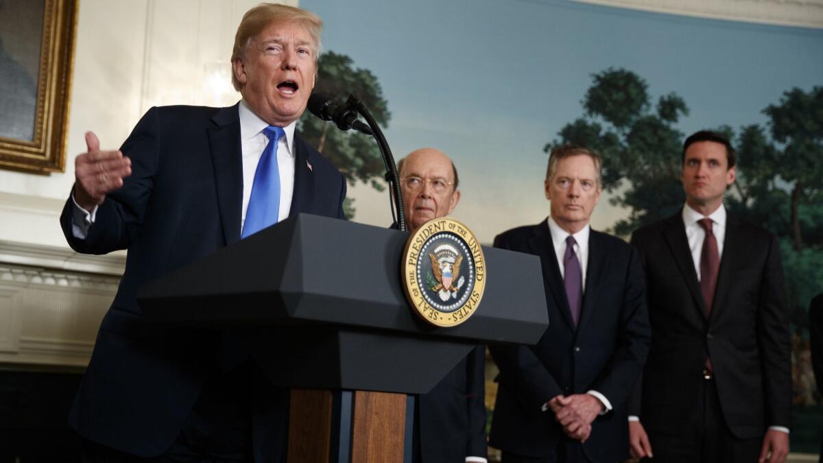 President Trump speaks before signing a presidential memorandum imposing tariffs and investment restrictions on China.