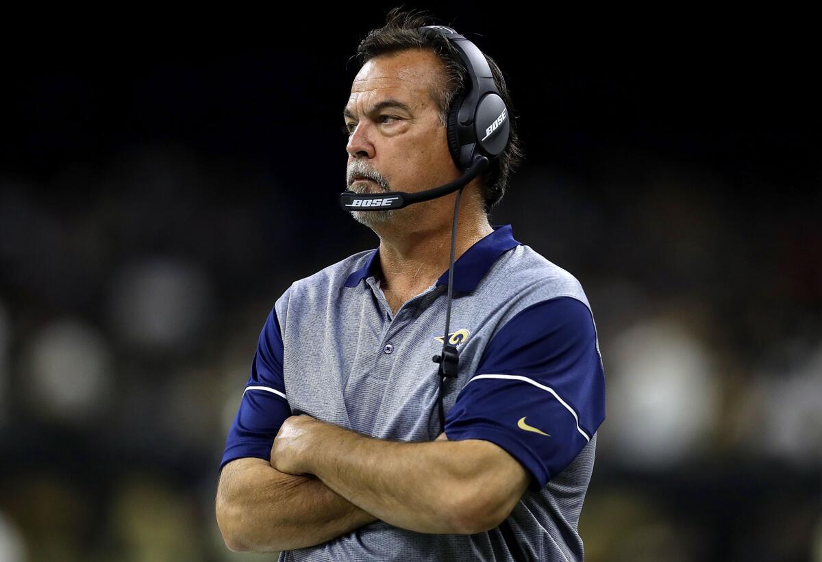 Rams Coach Jeff Fisher watches as his team falls to the Saints during their game Nov. 27.