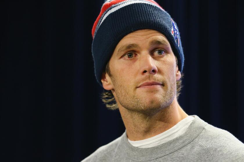 Patriots quarterback Tom Brady talks to the media during a news conference to address the under inflation of footballs used in the AFC championship game at Gillette Stadium on Jan. 22.