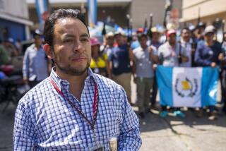 Luis Pacheco, President of the K'iche' Indigenous organization "48 Cantones de Totonicapan," poses for photos with Mayors, who are members of the organization, outside the Attorney General´s headquarters in Guatemala City, Wednesday, Oct. 11, 2023. The “48 Cantones de Totonicapán” is an Indigenous organization that has been leading the national protests asking for the resignation of Guatemala´s Attorney General Consuelo Porras for her attempts to invalidate the recent presidential election. (AP Photo/Moises Castillo)