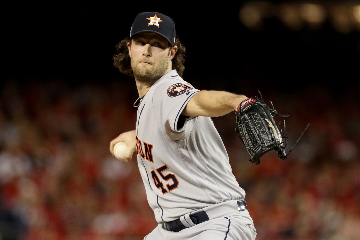 Gerrit Cole delivers a pitch against the Washington Nationals during the first inning in Game 5 of the World Series at Nationals Park on Oct. 27 in Washington, DC.