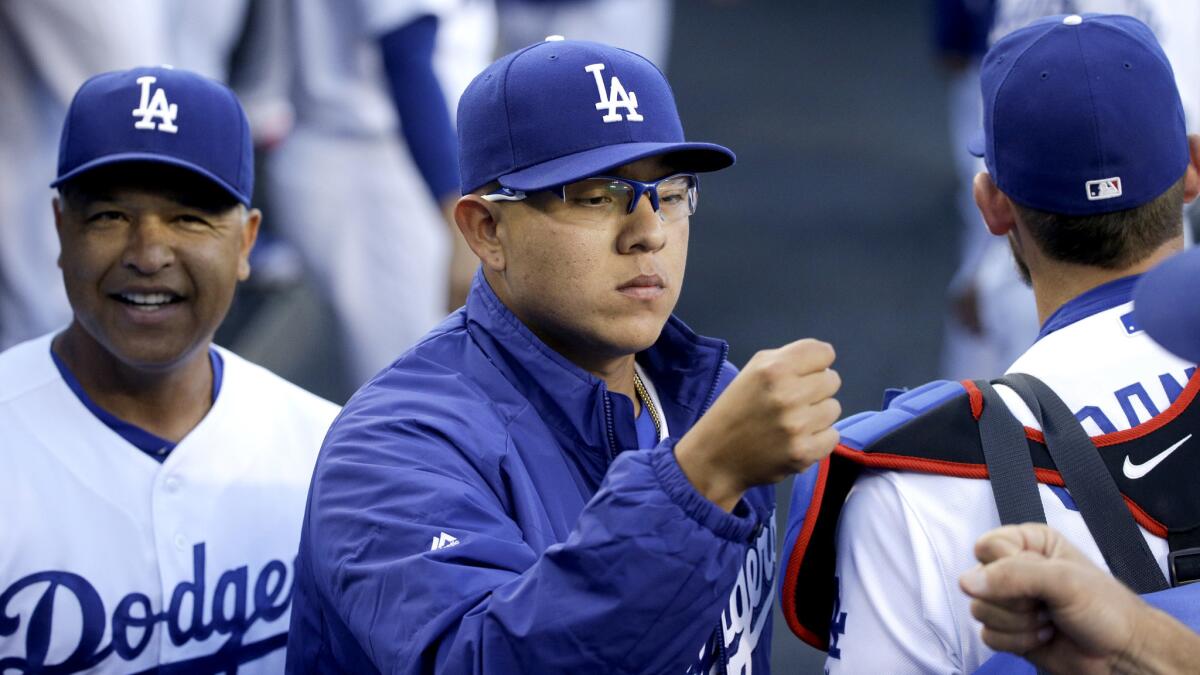 A bevy of talented young players, such as pitcher Julio Urias, center, and the new labor agreement put the Dodgers in good position entering the 2017 season.