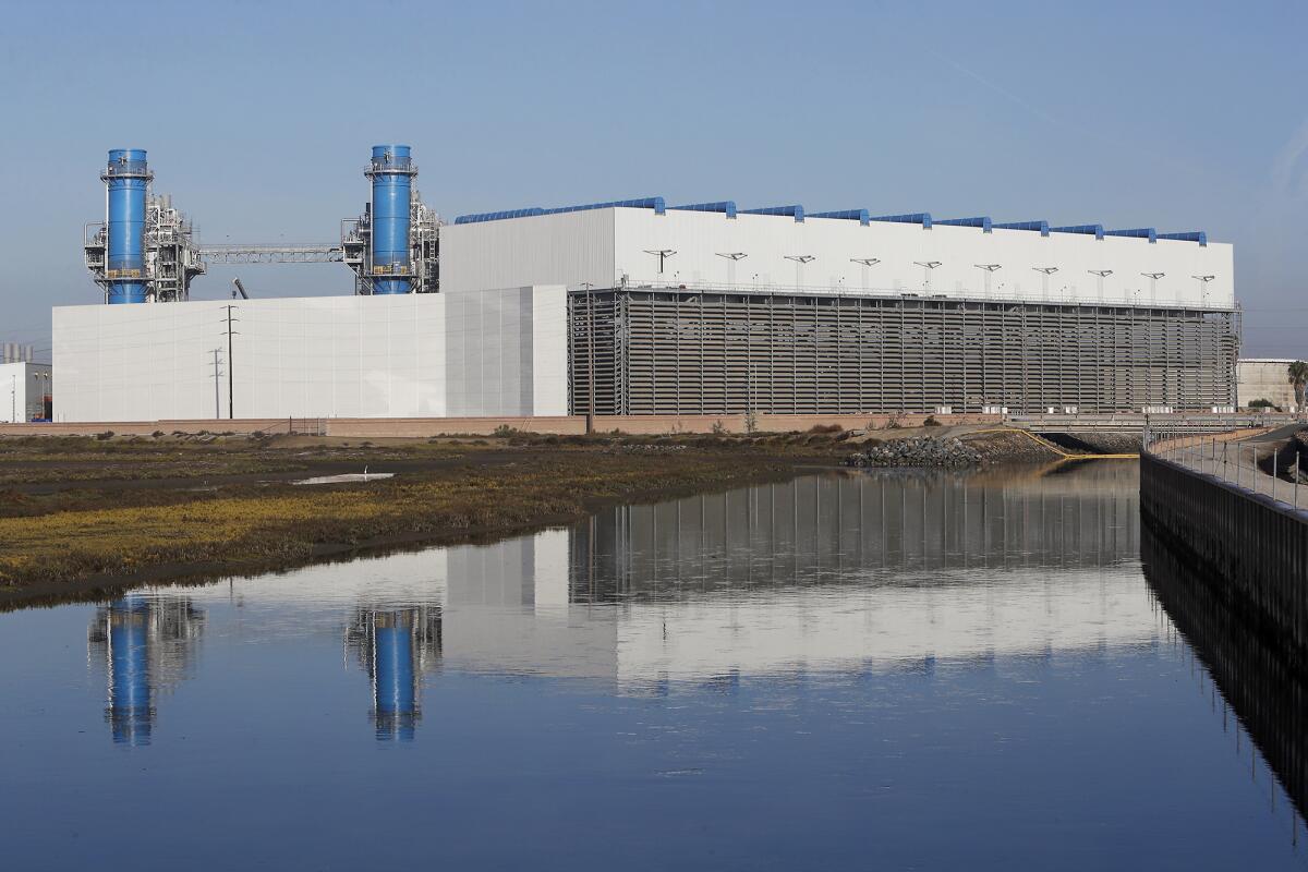 AES’ new Huntington Beach power plant is pictured Wednesday near Newland Street and Pacific Coast Highway.