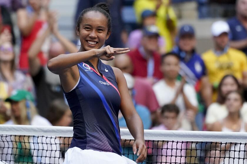 Leylah Fernandez, of Canada, reacts after defeating Elina Svitolina, of Ukraine, during the quarterfinals of the US Open tennis championships, Tuesday, Sept. 7, 2021, in New York. (AP Photo/Elise Amendola)