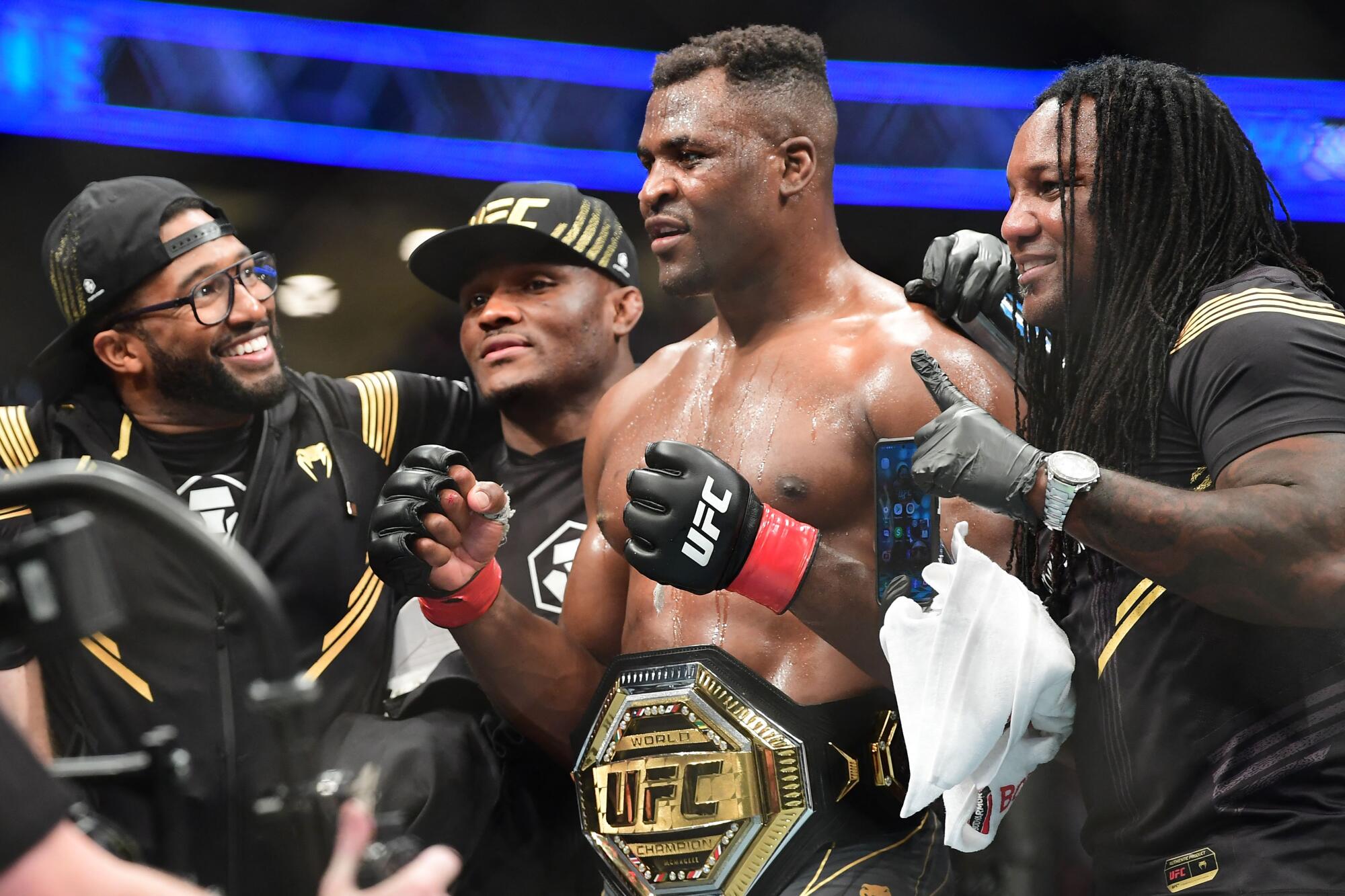 UFC 270 heavyweight world champion Francis Ngannou celebrates his victory over Ciryl Gane 