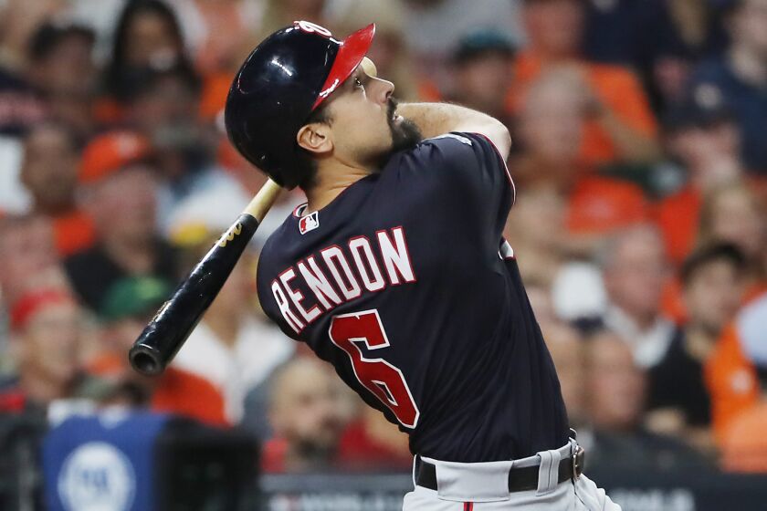 HOUSTON, TEXAS - OCTOBER 23: Anthony Rendon #6 of the Washington Nationals swings at a pitch against the Houston Astros during the seventh inning in Game Two of the 2019 World Series at Minute Maid Park on October 23, 2019 in Houston, Texas. (Photo by Elsa/Getty Images) ** OUTS - ELSENT, FPG, CM - OUTS * NM, PH, VA if sourced by CT, LA or MoD **