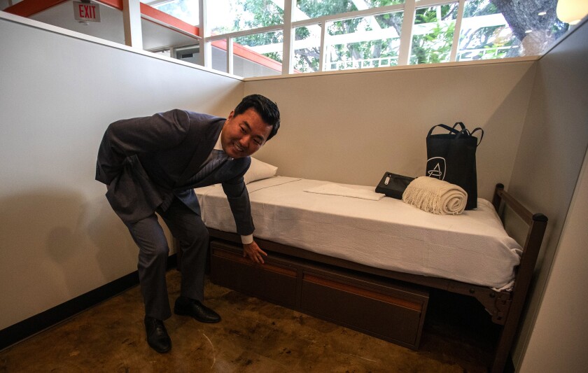 Los Angeles City Councilman David Ryu tours a 30-bed homeless center in Hollywood.