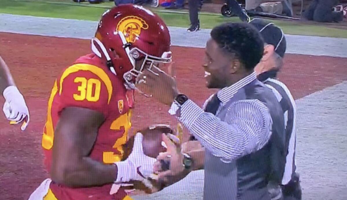 USC running back Markese Stepp celebrates with Reggie Bush after scoring against Utah in September.