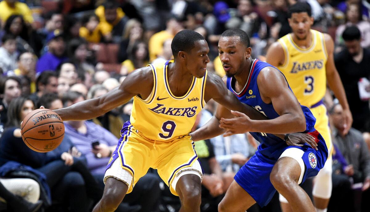 Clippers guard Avery Bradley pressures Lakers guard Rajon Rondo during a game earlier this season.