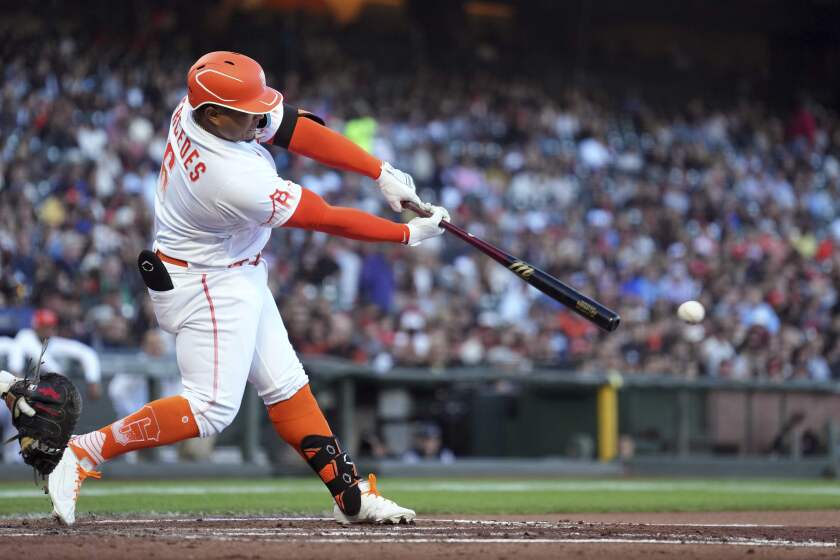 San Francisco Giants' Yermin Mercedes hits a single against the Detroit Tigers during the second inning of a baseball game Tuesday, June 28, 2022, in San Francisco. (AP Photo/Darren Yamashita)
