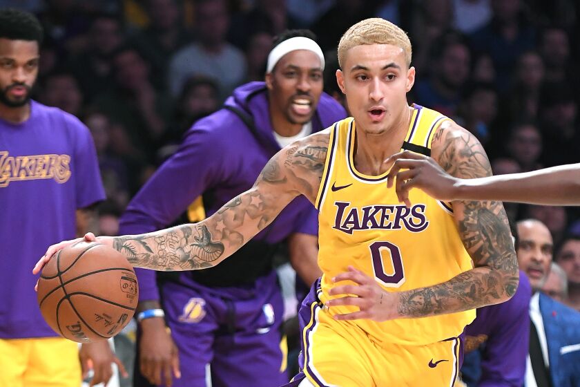 Kyle Kuzma drives to the basket during a game against the Knicks on Jan. 7 at Staples Center.