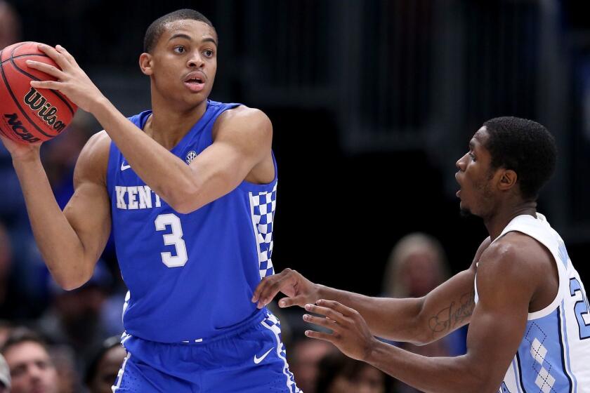 CHICAGO, ILLINOIS - DECEMBER 22: Keldon Johnson #3 of the Kentucky Wildcats handles the ball while being guarded by Kenny Williams #24 of the North Carolina Tar Heels in the second half during the CBS Sports Classic at the United Center on December 22, 2018 in Chicago, Illinois. (Photo by Dylan Buell/Getty Images) ** OUTS - ELSENT, FPG, CM - OUTS * NM, PH, VA if sourced by CT, LA or MoD **