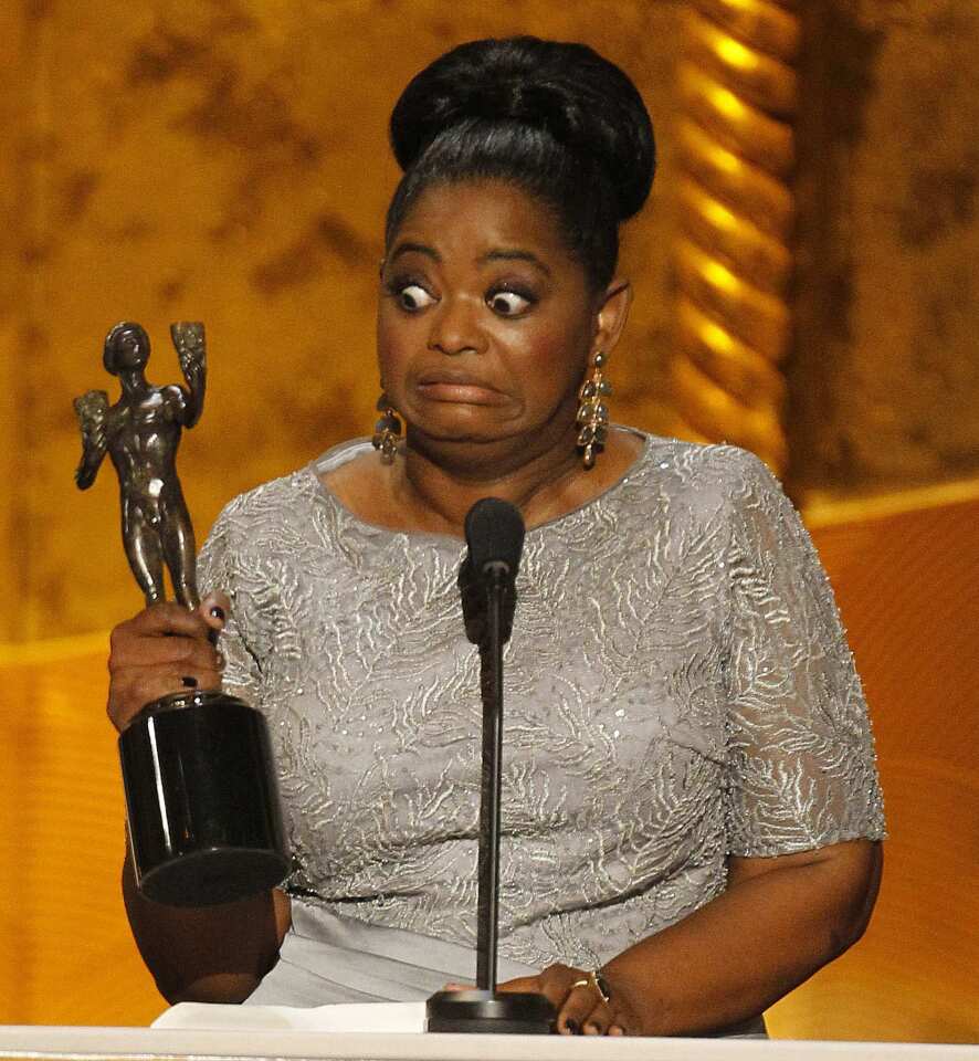 Octavia Spencer is surprised, and grateful, to be able to heft an Actor statuette. She was honored for outstanding performance by a female actor in a supporting role, for the film "The Help."