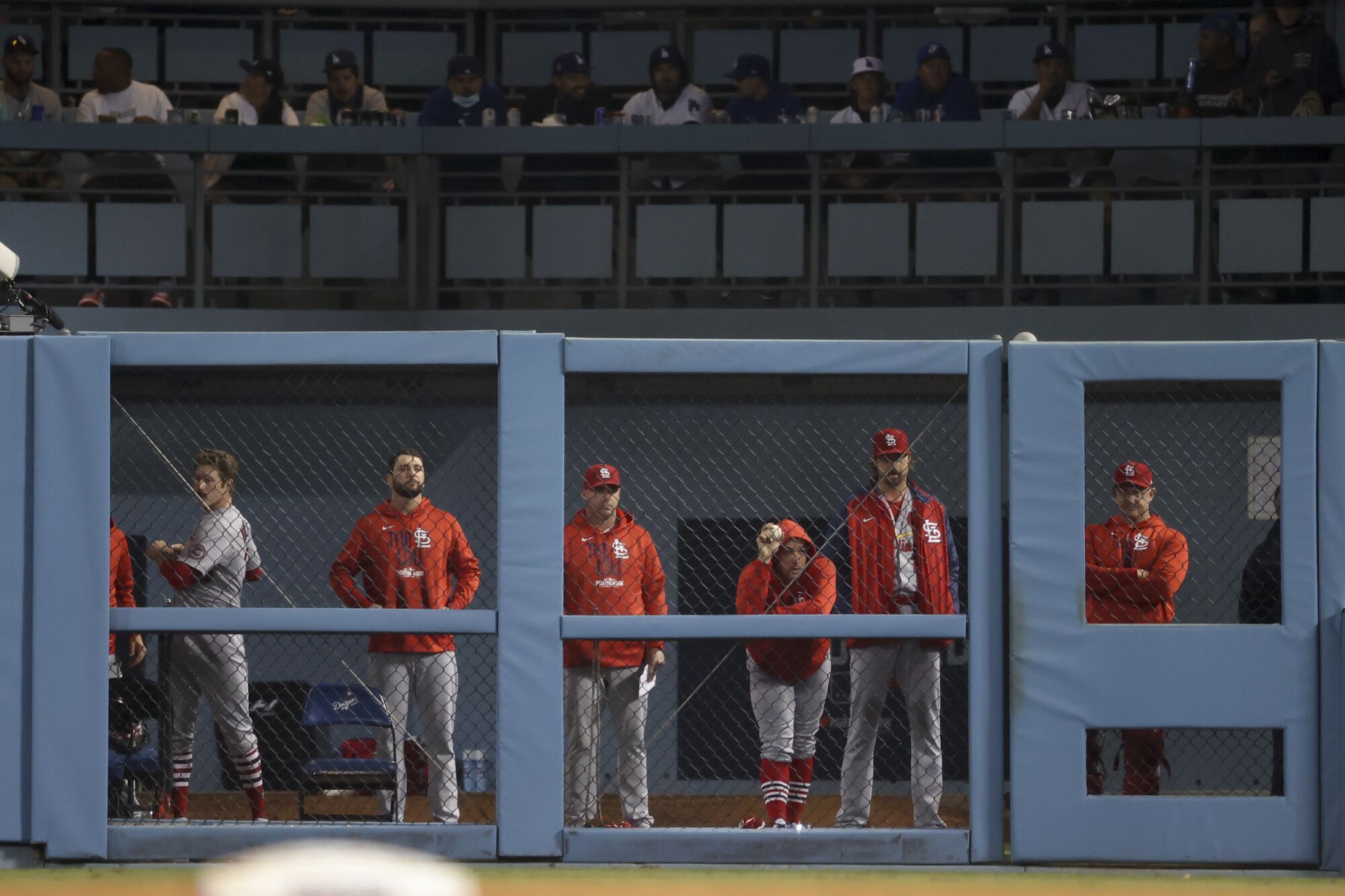 The St. Louis Cardinals bullpen watches the game during the seventh inning