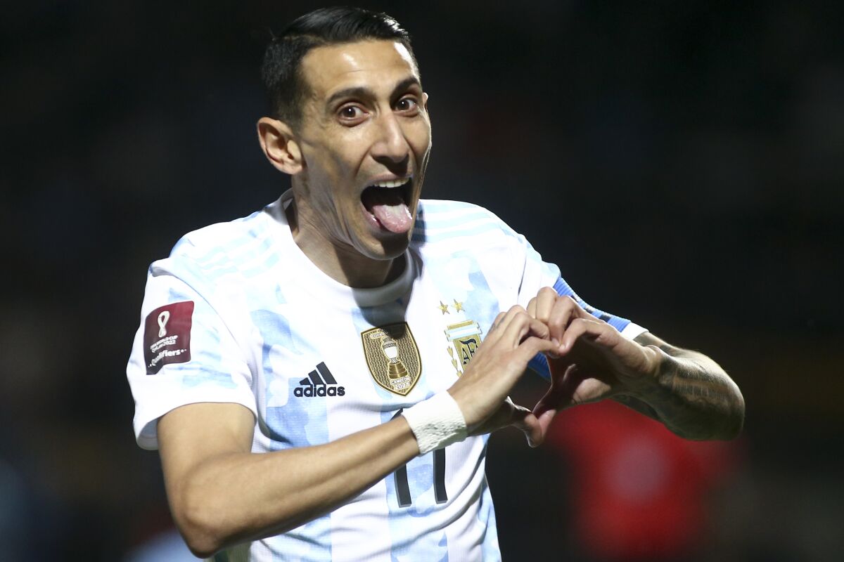 Argentina's Angel Di Maria celebrates scoring the opening goal against Uruguay during a qualifying soccer match for the FIFA World Cup Qatar 2022 in Montevideo, Uruguay, Friday, Nov. 12, 2021. (Ernesto Ryan/Pool Via AP)