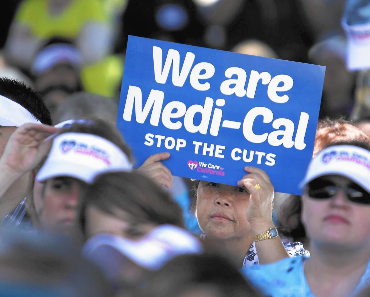 Protesters rally in 2013 against cuts to Medi-Cal.