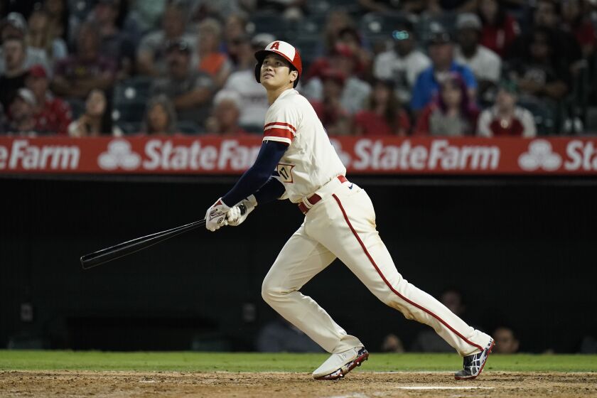 The Angels' Shohei Ohtani watches his RBI double during the seventh inning against the White Sox on June 28, 2022.