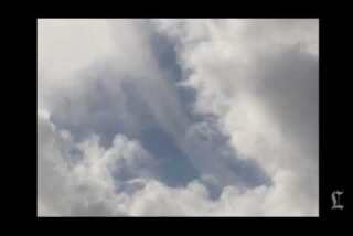 Watch: Waterspout touches down off Newport Beach