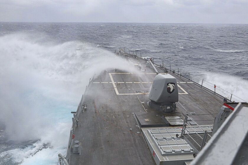 In this photo provided by the U.S. Navy, the Arleigh Burke-class guided-missile destroyer USS Milius (DDG 69) steams in the Philippine Sea, on March 13, 2023. The United States denied Chinese claims Thursday, March 23, that its military had driven away an American guided-missile destroyer from operating around disputed islands in the South China Sea, in an incident that comes as tensions in the region between the two powers continue to rise. The U.S. Navy's 7th Fleet said that a statement from China's Southern Theatre Command that it had forced the USS Milius away from waters around the Paracel Islands — called Xisha by China — was “false.”(Mass Communication Specialist 1st Class Greg Johnson/U.S. Navy via AP)