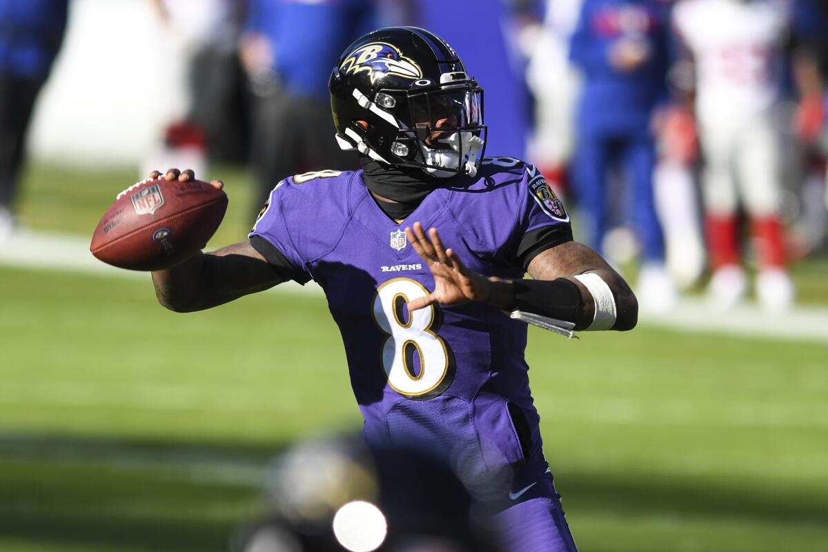Baltimore Ravens quarterback Lamar Jackson passes against the New York Giants.