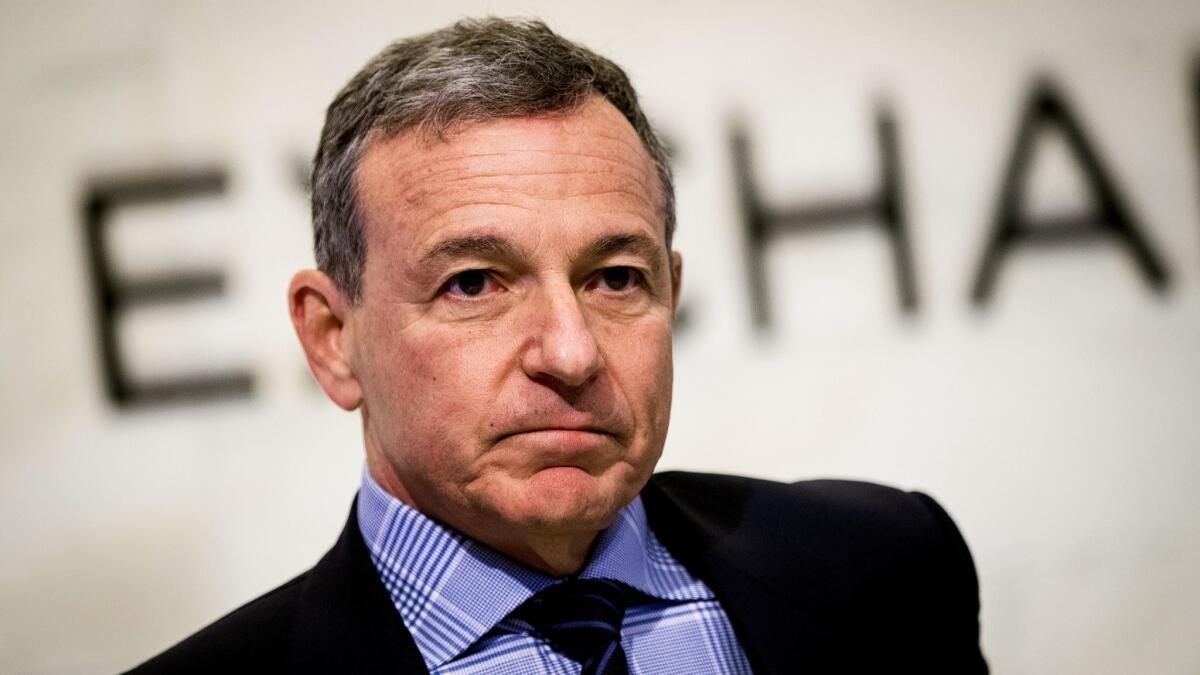 Disney CEO Bob Iger, shown in 2017, now must weigh whether to increase Disney's $52.4-billion bid for much of 21st Century Fox after Comcast offered 19% more for the same assets.