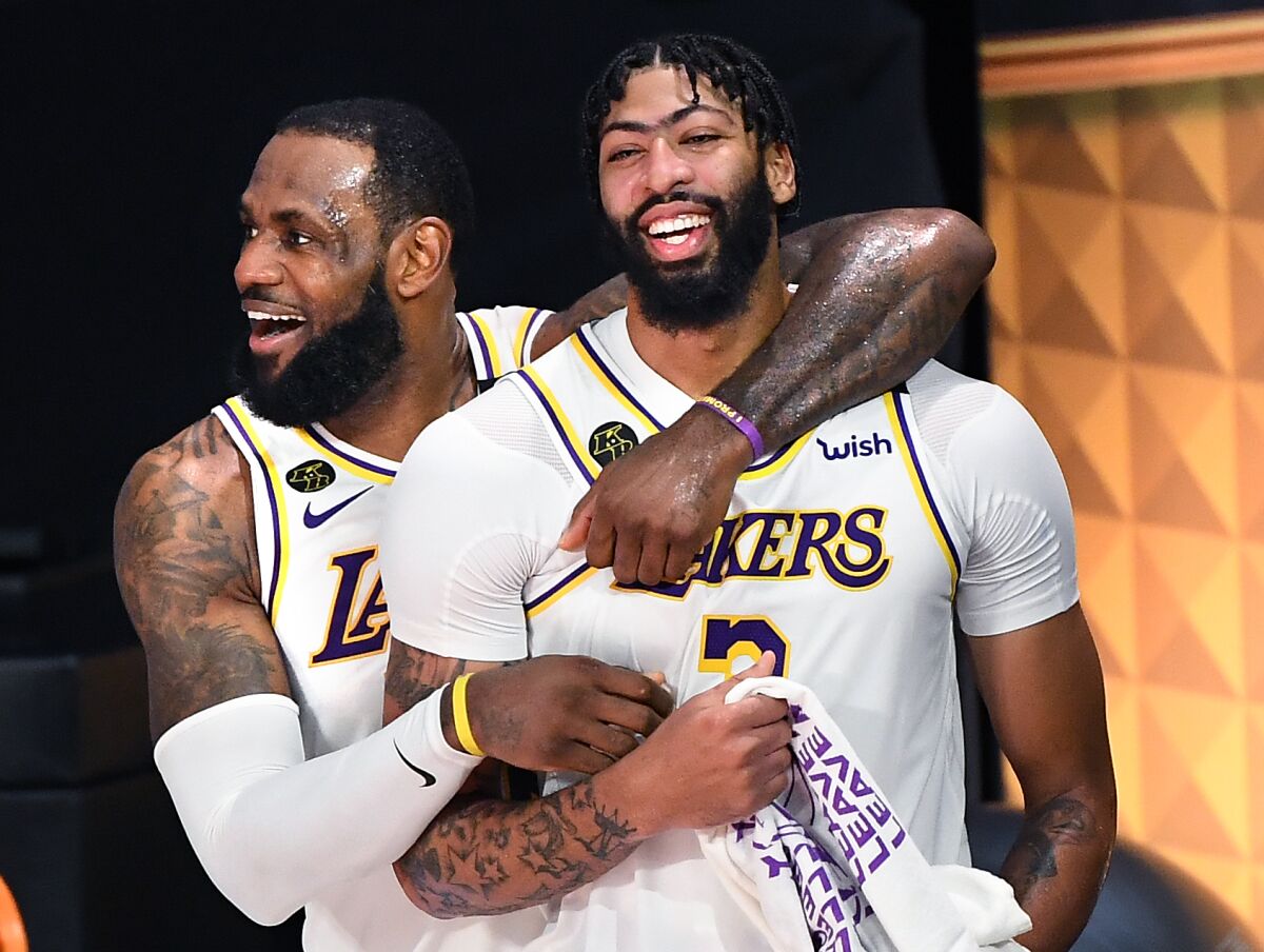 LeBron James, left, and Anthony Davis celebrate in the closing seconds of Game 6 of the NBA Finals
