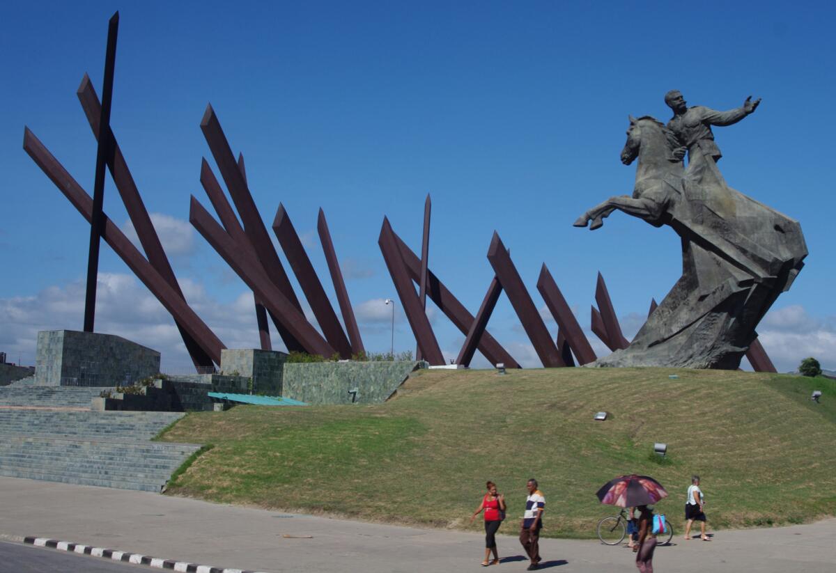 Alberto Lescay's "El Titan de Bronce" (The Bronze Titan) at the center of Santiago de Cuba's Revolution Square. (Randy Lewis / Los Angeles Times)