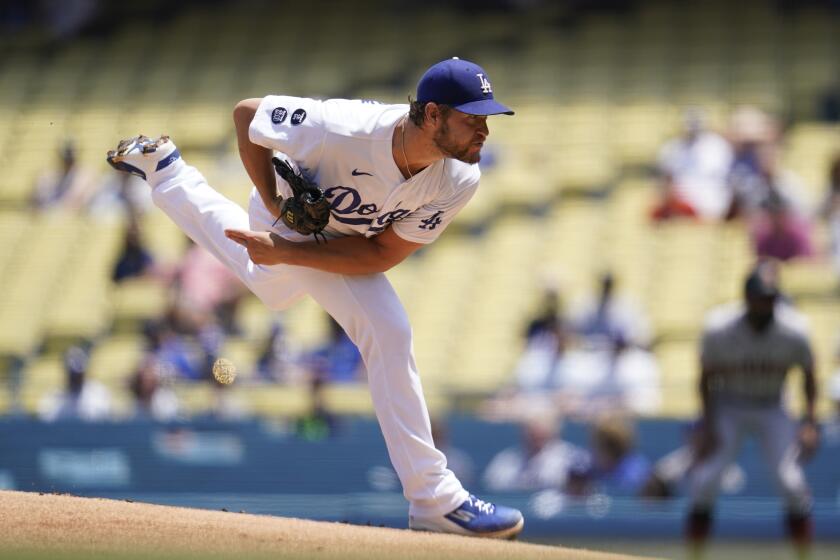 Los Angeles Dodgers starting pitcher Clayton Kershaw (22) throws during the first inning.