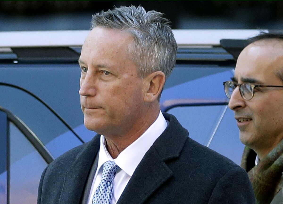 In this March 12, 2019 file photo, Martin Fox arrives at federal court in Boston to face charges.