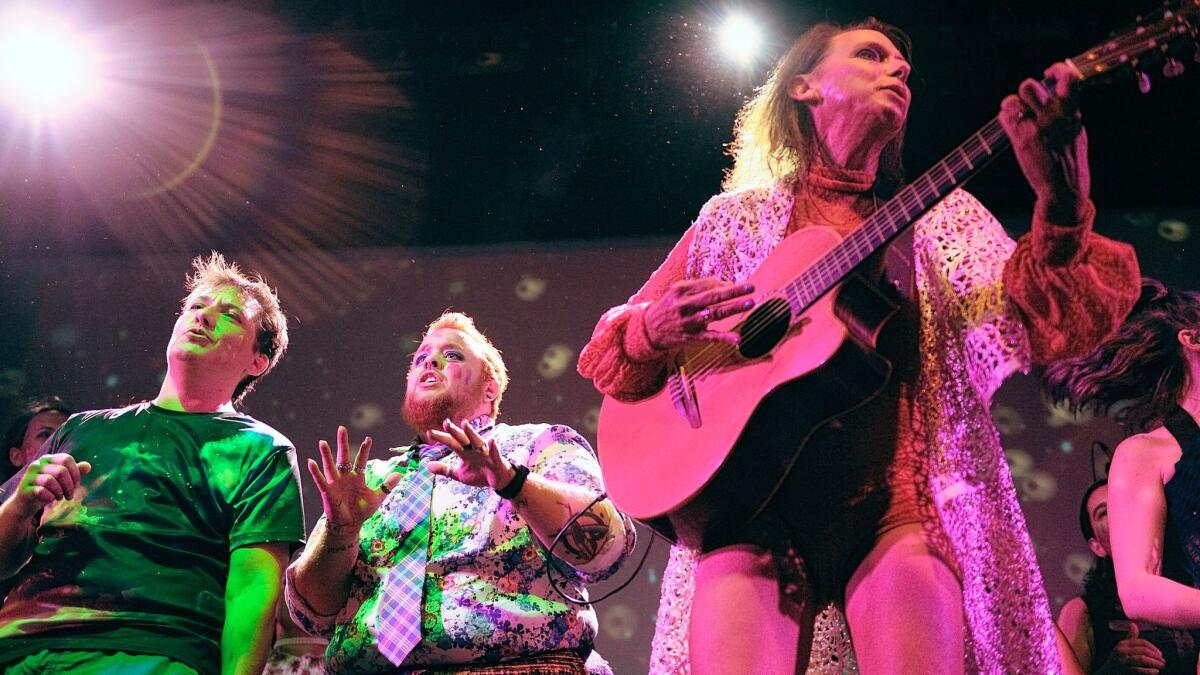 Lindsey Deaton, founder of the Trans Chorus of Los Angeles, performs with Rob Carrillo, left, and Erick Lash during "The Rise and Fall of Ziggy Stardust and the Spiders From Mars."