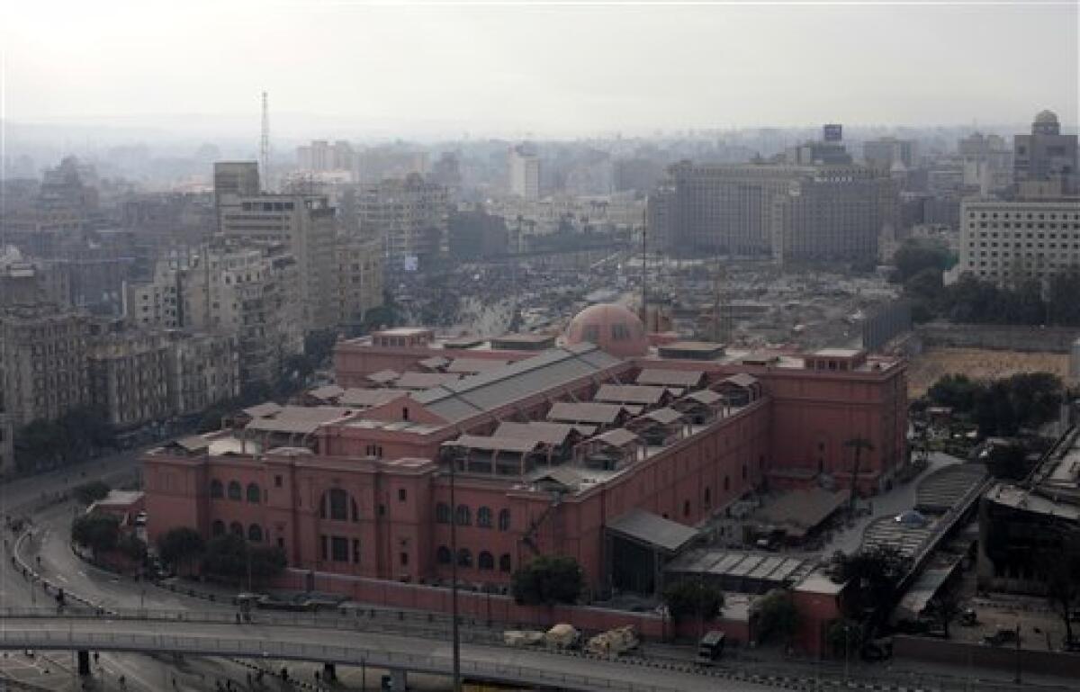 A view of Tahrir square, or Liberation, Square, with the Egyptian Museum, foreground, in Cairo, Egypt, Tuesday, Feb 1, 2011. Security officials say authorities have shut down all roads and public transportation to Cairo, where tens of thousands of people are converging to demand the ouster of Egyptian President Hosni Mubarak after nearly 30 years in power. (AP Photo/Lefteris Pitarkis)