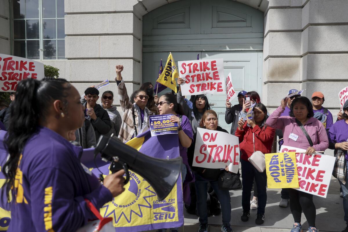 L.A. fast-food workers ask city officials to approve Fair Work Week law ...