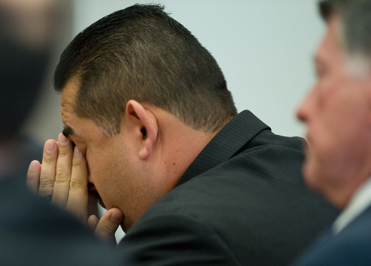 Former Fullerton Police Officer Manuel Ramos reacts after his acquittal in the beating death of a homeless man.
