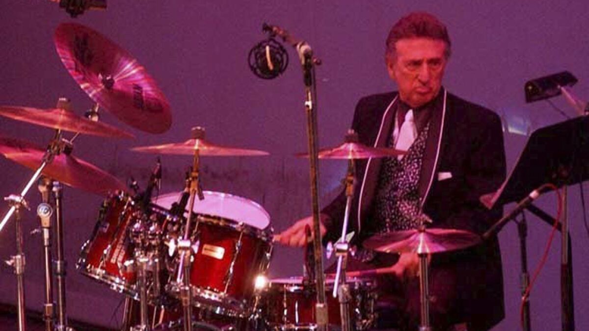 Longtime Elvis Presley drummer D.J. Fontana performs at the 50th anniversary celebration concert of Presley's first performance at the "Louisiana Hayride" in Shreveport, La., on Oct. 16, 2004.