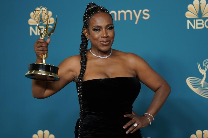 Sheryl Lee Ralph poses in the press room with the award for outstanding supporting actress in a comedy series for "Abbott Elementary" at the 74th Primetime Emmy Awards on Monday, Sept. 12, 2022, at the Microsoft Theater in Los Angeles. (AP Photo/Jae C. Hong)