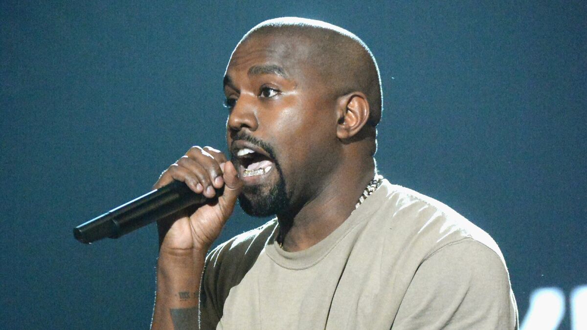 Kanye West accepts the Video Vanguard Award onstage during the 2015 MTV Video Music Awards.
