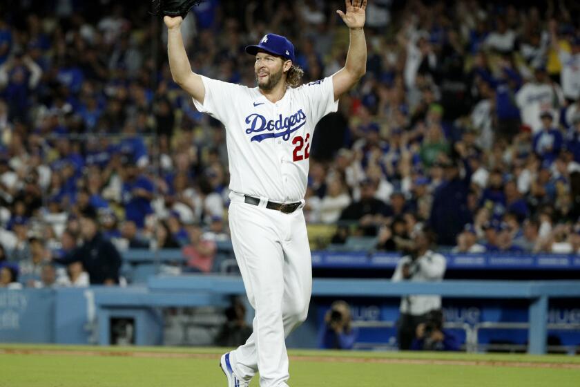 Dodgers pitcher Clayton Kershaw reacts during a game against the San Francisco Giants at Dodger Stadium on Sept. 23, 2023.